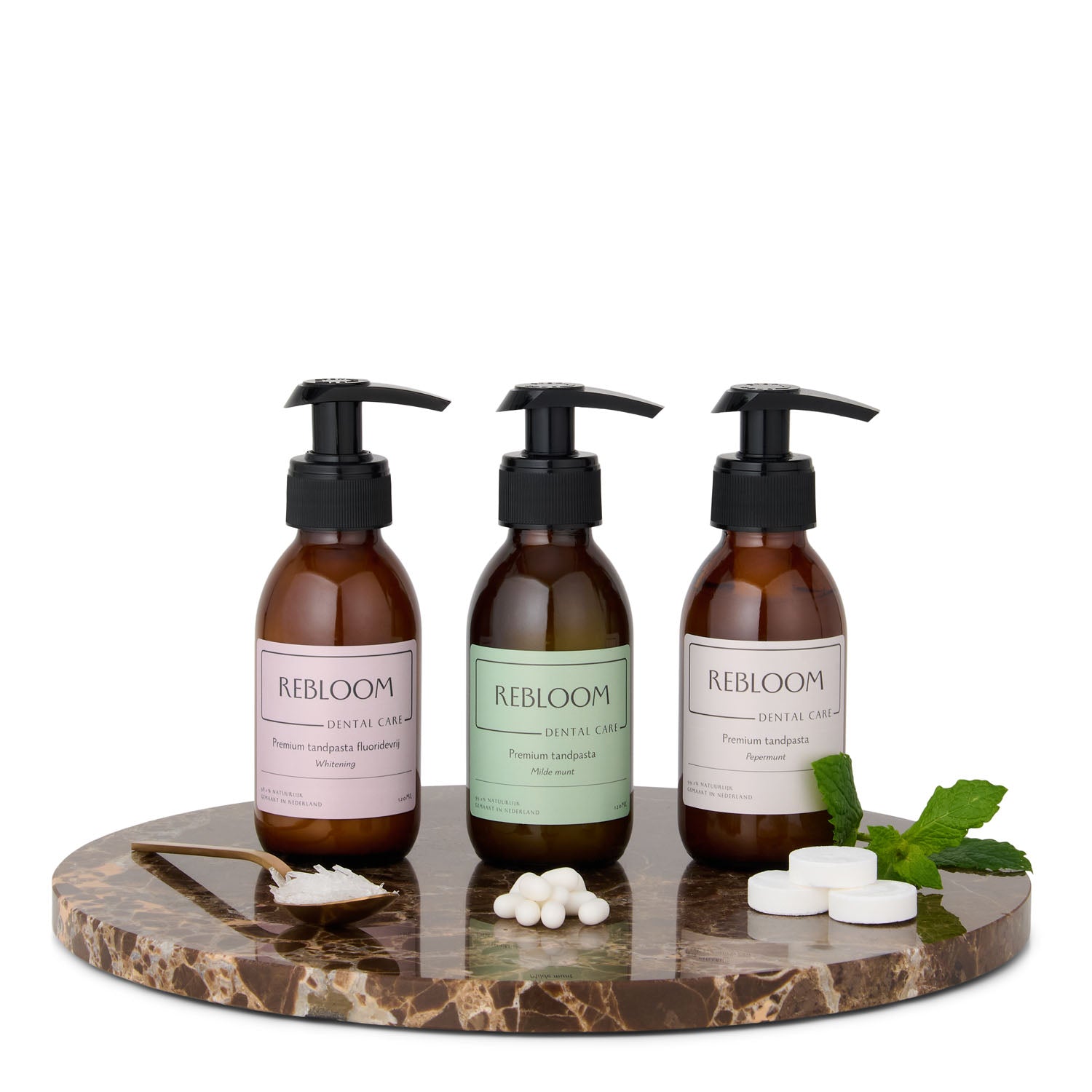3 glazen flesjes met pomp. Fluoridevrij - roze, milde munt- groen, pepermunt - wit. 