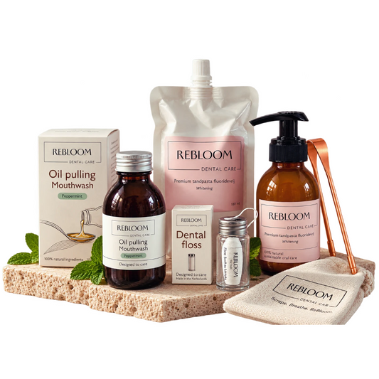 mondverzorgingsset aanbevolen door biologische tandarts met fluoridevrije tandpasta in flesje en refill, oil pulling, flos en koperen tongschraper